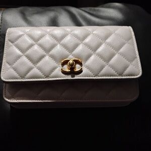 White and gold Chanel Purse. Brand new.